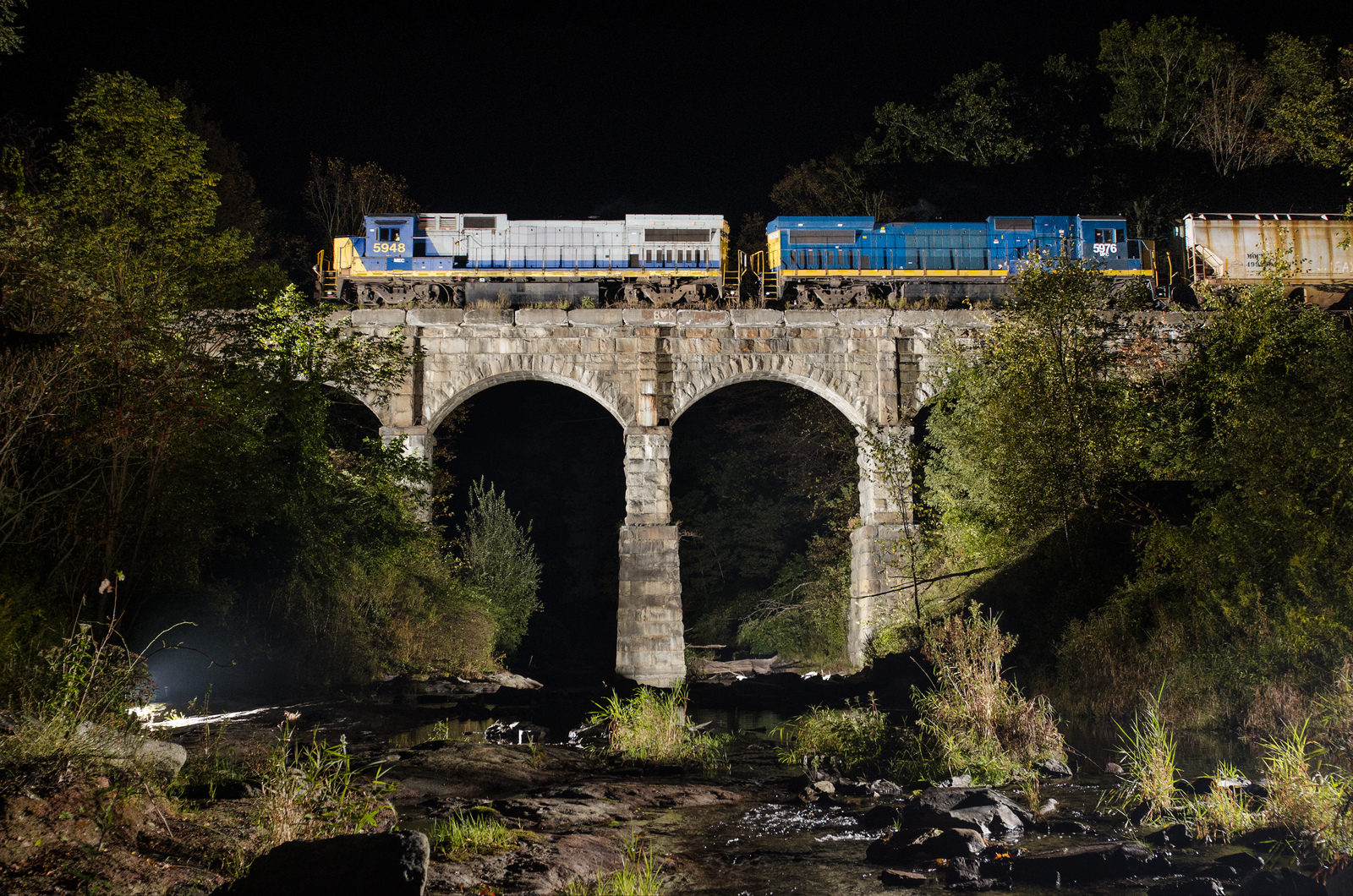ex CSX B40-8s on a stone arch bridge