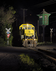 gp40 3040 passing an elevated crossing gate tower