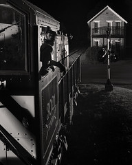 view of engineer from a train at night