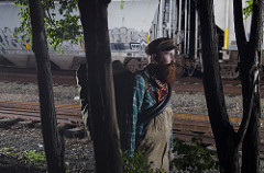 hobo in a rail yard